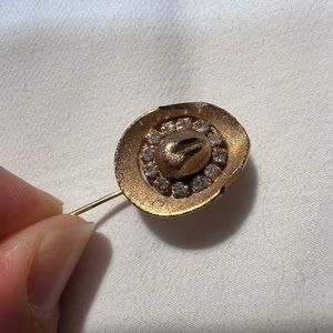 Vintage cowboy hat straight hat pin.  Gold tone with rhinestone.